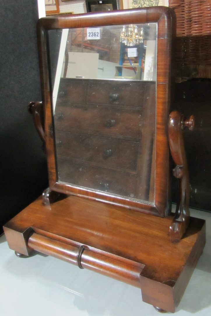 Appraisal: A th century mahogany swing frame toilet mirror