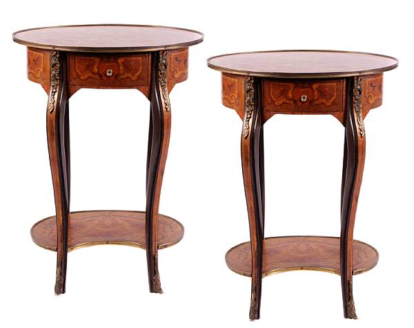 Appraisal: A pair of inlaid and bronze mounted oval tables height