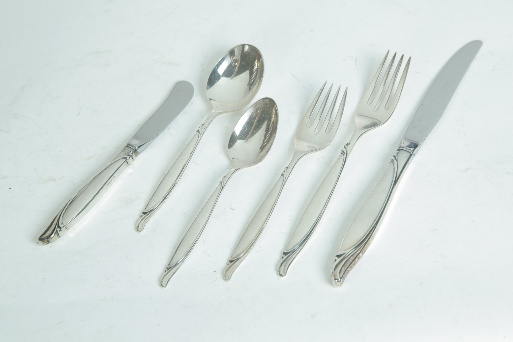 Appraisal: SET OF HEIRLOOM STERLING SENTIMENTAL PATTERN FLATWARE American th quarter-