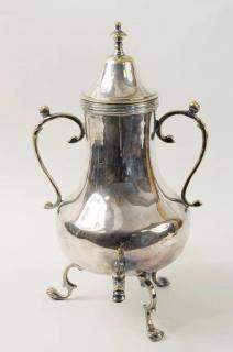 Appraisal: Continental Silvered Brass Footed Water Urn Possibly th century Continental