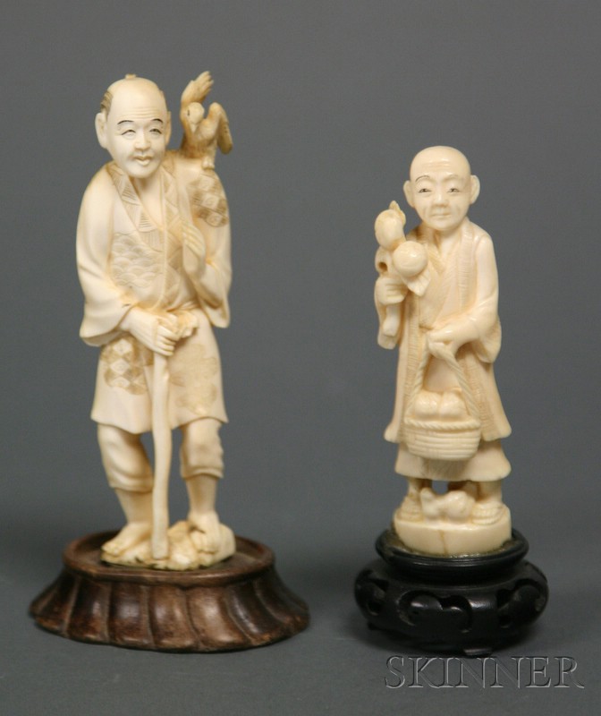 Appraisal: Two Ivory Carvings Japan late th century figures of a