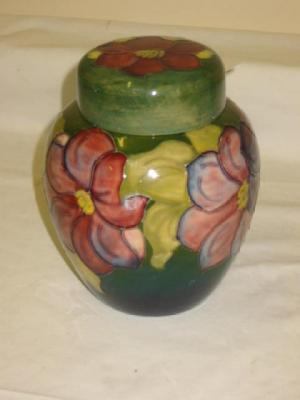 Appraisal: A WALTER MOORCROFT POTTERY GINGER JAR of ovoid form tube