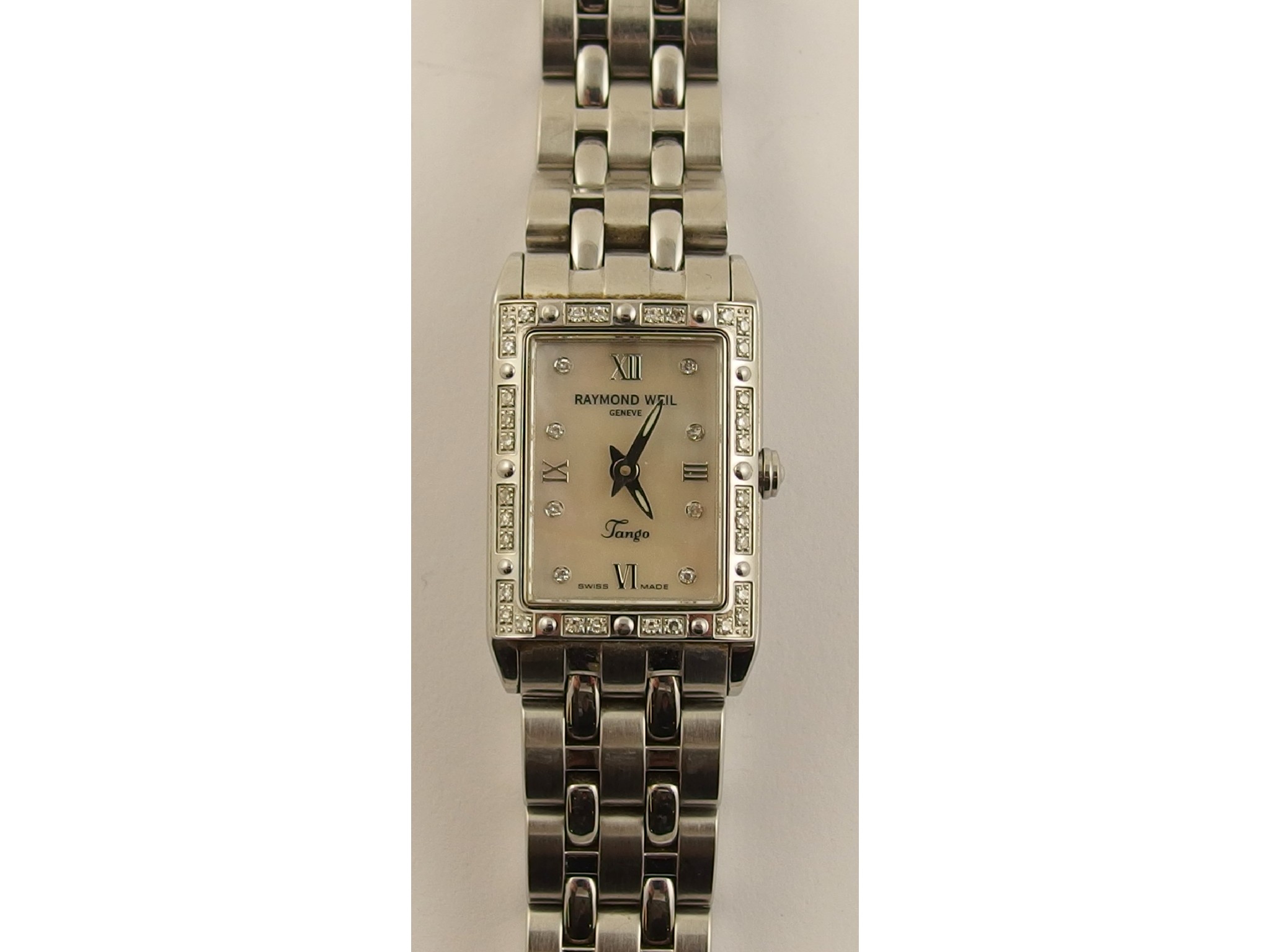 Appraisal: A ladies diamond set Raymond Weil Tango watch with a