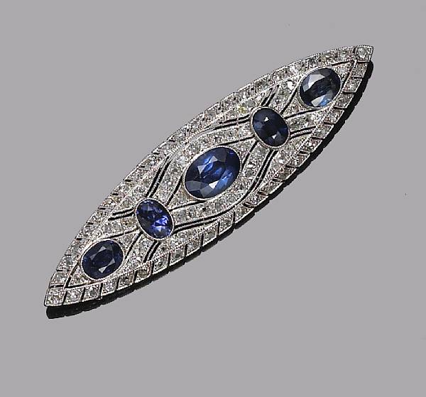 Appraisal: A sapphire and diamond brooch estimated total diamond weight carats