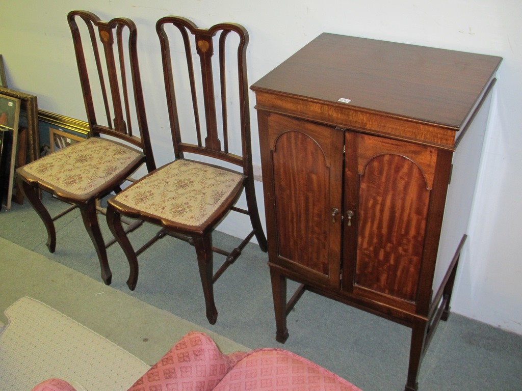 Appraisal: Lot comprising mahogany music cabinet and a pair of Edwardian