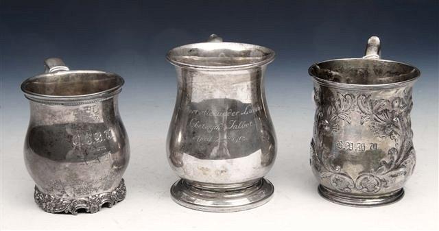 Appraisal: A GEORGE V BALUSTER SHAPED SILVER TANKARD on turned stepped