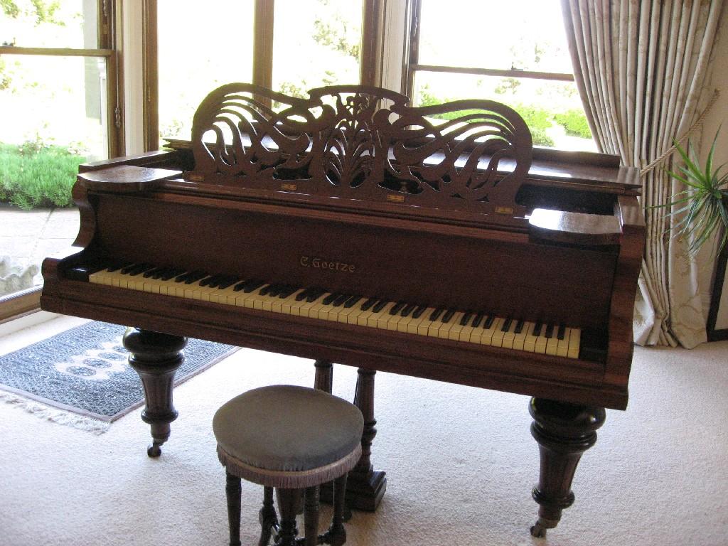 Appraisal: A Goetze Baby Grand Piano No in polished wood case