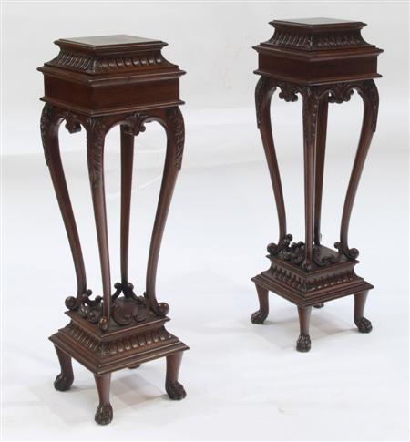 Appraisal: A near pair of Anglo Indian rosewood jardiniere stands the