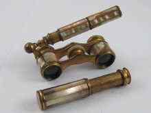 Appraisal: An opera duo of a pair of opera glasses with