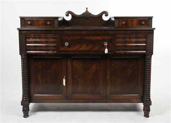 Appraisal: An American Empire Mahogany Server having a shaped backboard centered