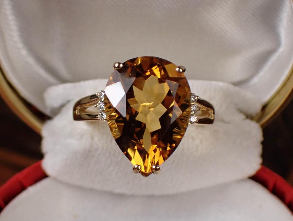 Appraisal: CITRINE DIAMOND AND FOURTEEN KARAT GOLD RING The k yellow