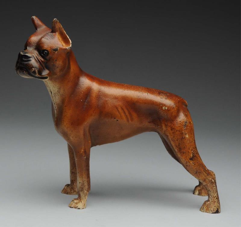 Appraisal: Cast Iron Boxer Dog Doorstop Made by Hubley Full-figure boxer