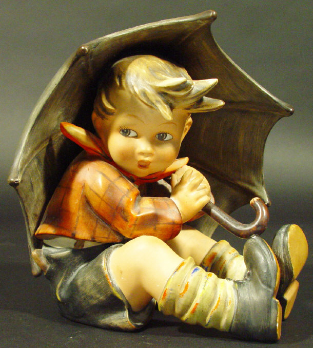 Appraisal: Large Hummel figure of a boy with umbrella with hand