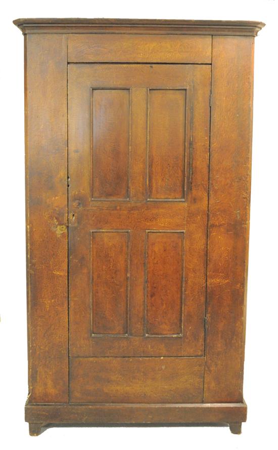 Appraisal: Tall cabinet with crown molding single four-paneled door on four