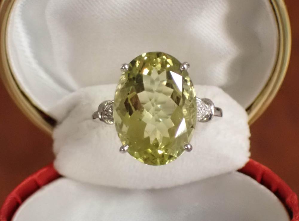 Appraisal: LEMON QUARTZ DIAMOND AND FOURTEEN KARAT WHITE GOLD RING with