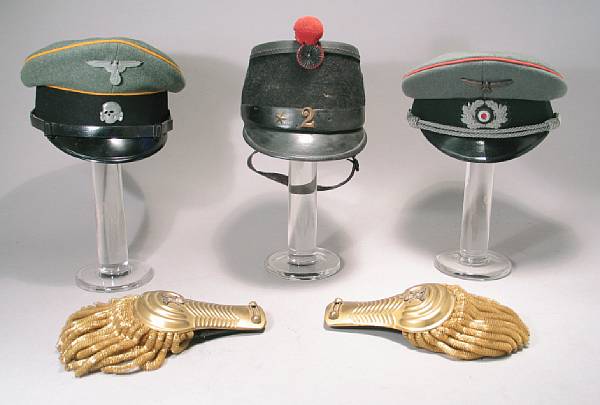 Appraisal: A lot of three German military headgear Including a Model