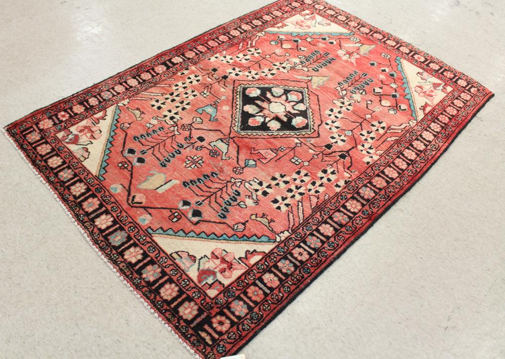 Appraisal: SEMI-ANTIQUE PERSIAN TRIBAL AREA RUG floral and central square medallion