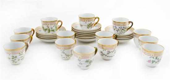 Appraisal: Royal Copenhagen Flora Danica porcelain cups and saucers gilt rims