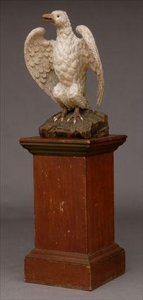 Appraisal: AMERICAN OR ENGLISH CARVED AND PAINTED WOOD BIRD Rendered with