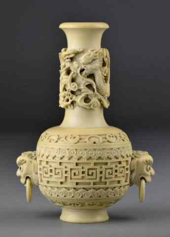 Appraisal: A Fine Chinese Carved Ivory Two Piece VaseFinely carved to