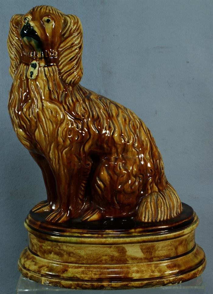 Appraisal: Rockingham style brown glazed figure of a spaniel h x