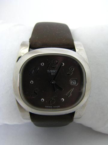 Appraisal: Lady's Tissot Wristwatch Sapphire Crystal Stainless Steel Date at O'Clock