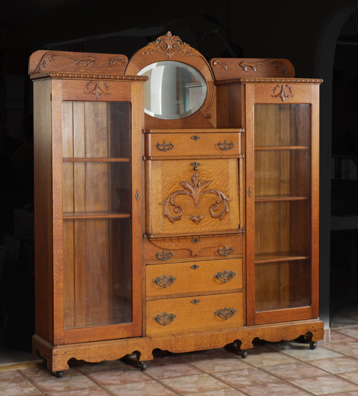 Appraisal: CARVED OAK DOUBLE SECRETARY BOOKCASE Center section with carved foliate