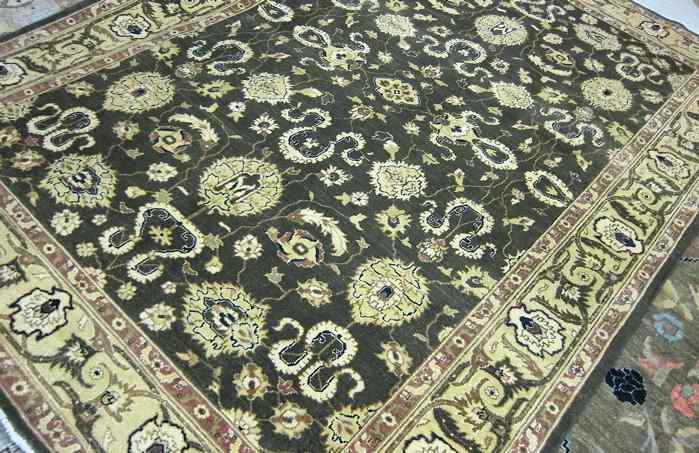 Appraisal: HAND KNOTTED ORIENTAL CARPET Pakistani-Persian overall floral arabesque design on