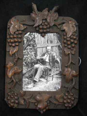 Appraisal: Black Forest Carved Picture Frame grape vine design photograph shows