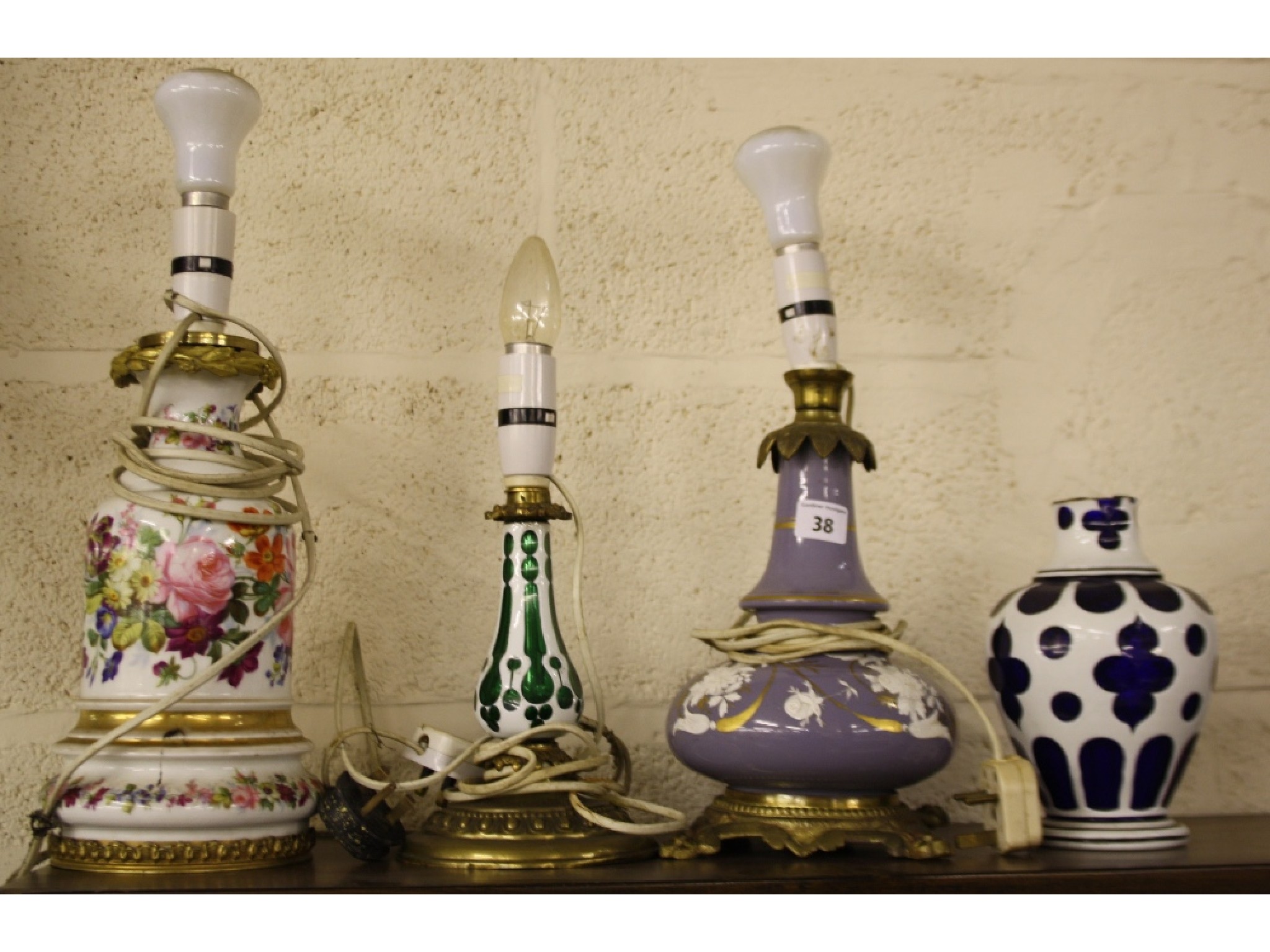 Appraisal: Three Victorian opaline overlaid glass vases converted into table lamps