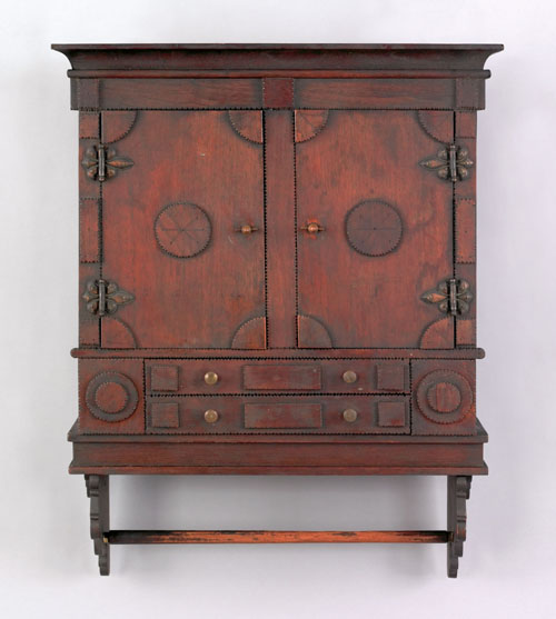 Appraisal: Tramp art walnut hanging cupboard late th c with doors