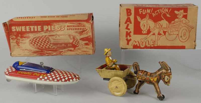 Appraisal: Lot of Tin Litho Vehicle Wind-Up Toys Description American Working