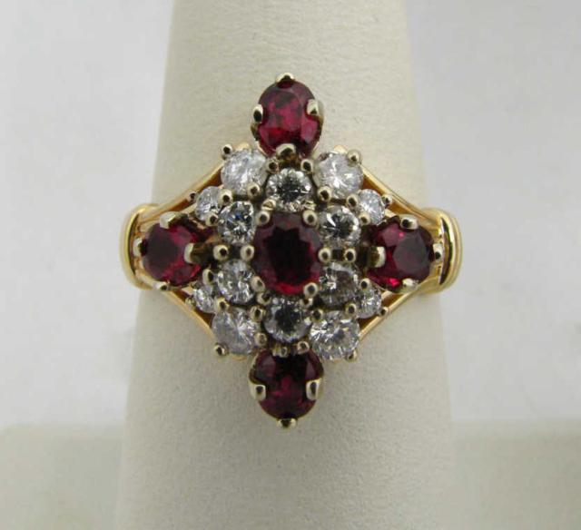 Appraisal: k white gold ct oval ruby and tw diamond cluster