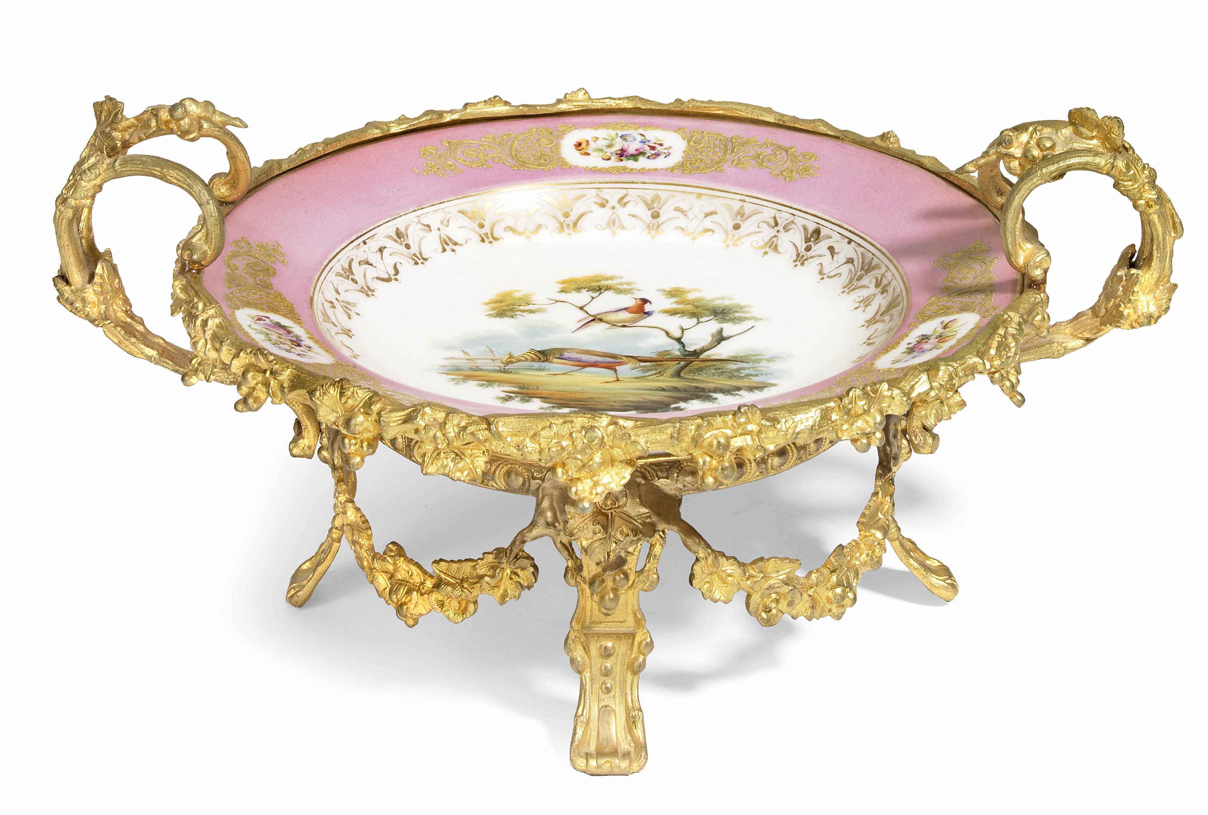 Appraisal: A Svres style gilt bronze mounted porcelain center bowl early