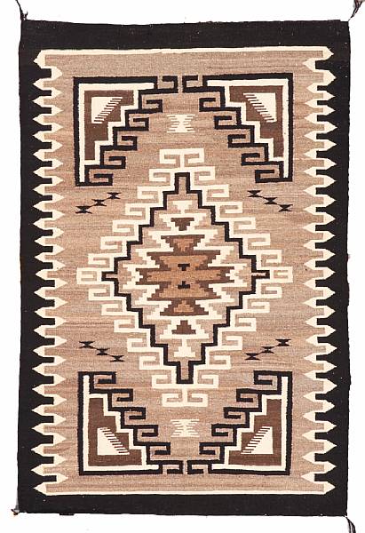 Appraisal: A Navajo Two Grey Hills rug size approximately ft in