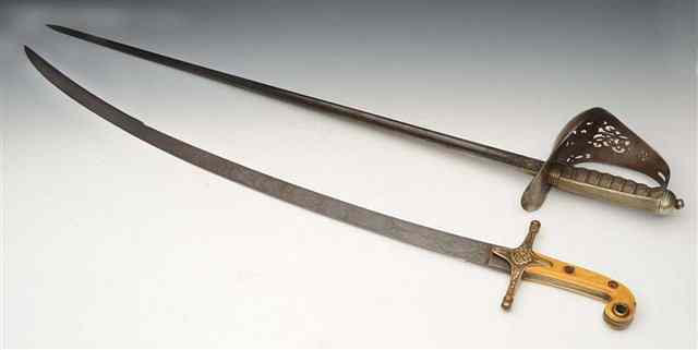 Appraisal: A TH CENTURY DRESS SWORD with ivory handle and engraved