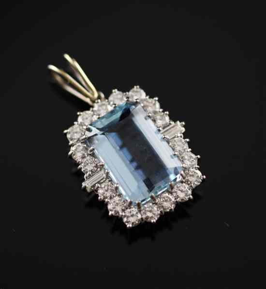 Appraisal: An ct white gold aquamarine and diamond cluster pendant in