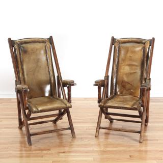 Appraisal: Pair Victorian folding leather campaign chairs Pair Victorian folding leather