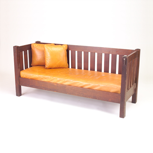 Appraisal: ARTS CRAFTS Cube settee with vertical slats to back and