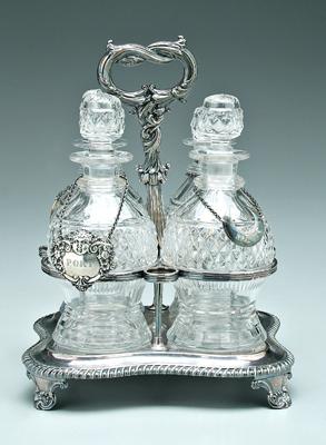 Appraisal: Silver plated decanter set shaped square base foliate arm and