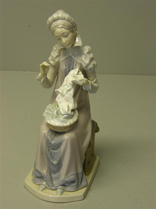 Appraisal: Lladro figure of a girl sewing h in