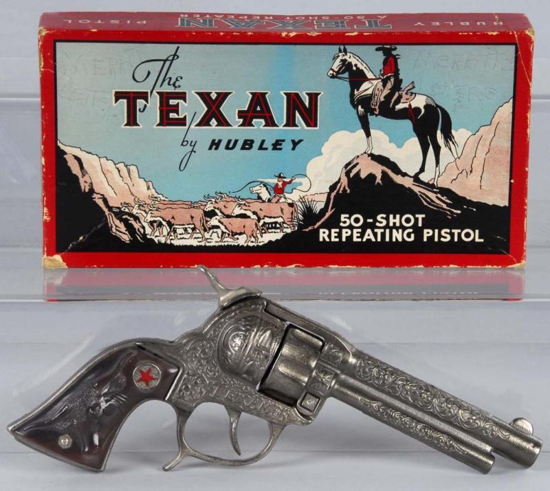 Appraisal: Cast Iron Hubley Texan Cap Gun Description Gun has replacement