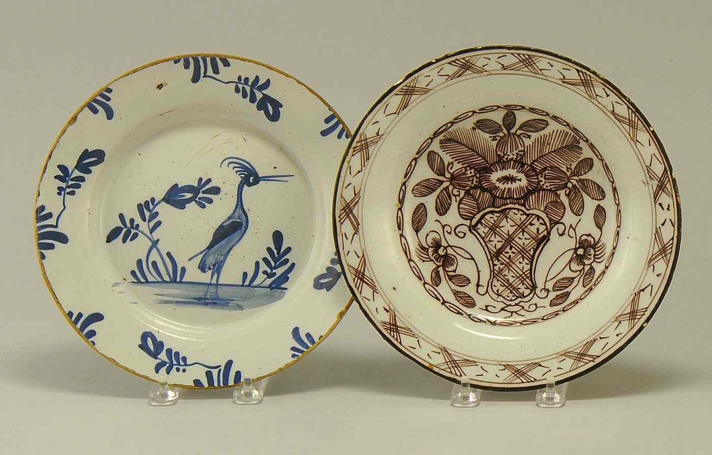 Appraisal: TWO ANTIQUE DELFT POTTERY PLATES th CenturyOne blue and white