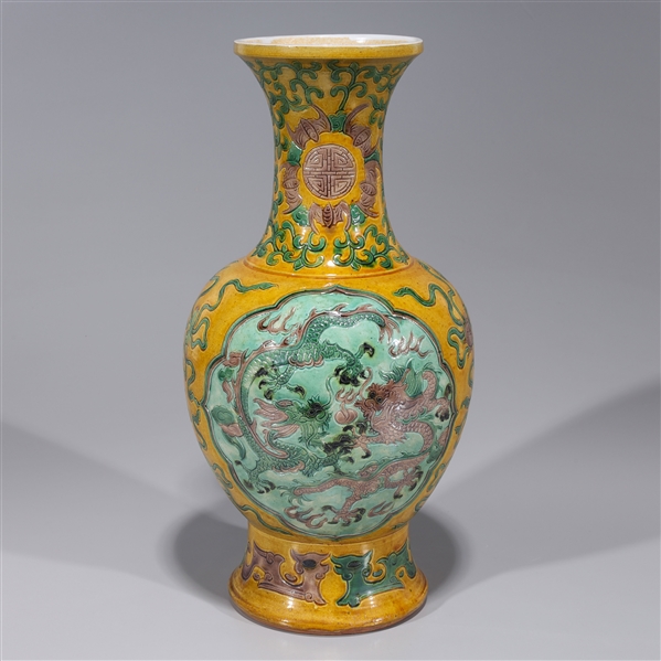 Appraisal: Chinese straw glazed enameled porcelain vase with dragons chasing flaming