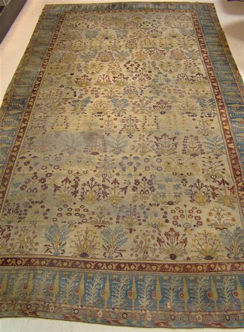 Appraisal: LARGE ANTIQUE INDIAN KIRMAN RUG the garden scene on cream