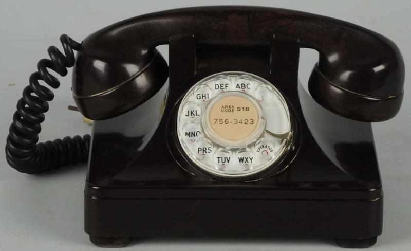 Appraisal: Dark Brown North Cradle Telephone Shell base and dial dated