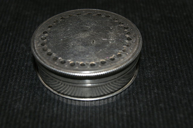 Appraisal: A SILVER PATCH BOX with rope twist border by Hester