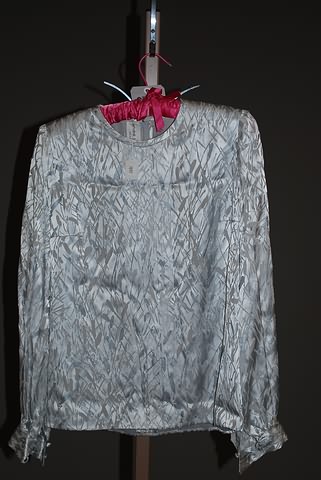 Appraisal: Andre Laug silver silk LS jewel neck pleated front lined