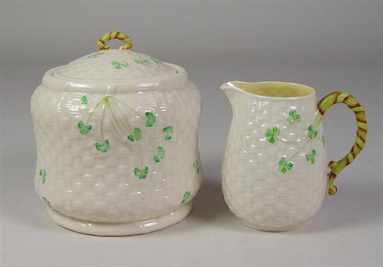 Appraisal: Irish Belleek Biscuit Jar Cream Pitcher Early th Century Biscuit