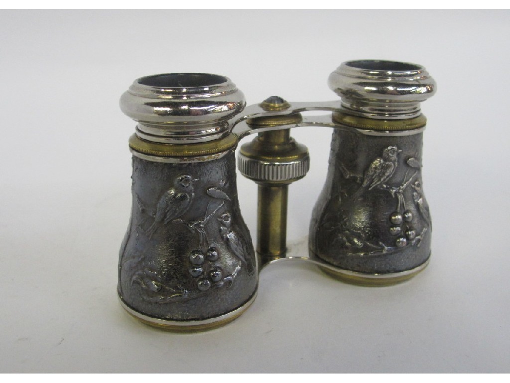 Appraisal: Pair of opera glasses with embossed bird decoration